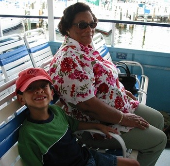 Bernice (looking cool in her shades) and Alex on the Jungle Queen